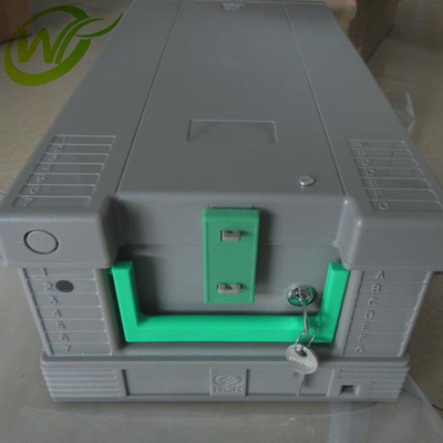 Η κασέτα νομίσματος NCR 58XX S1 μερών μηχανών του ATM με το μέταλλο κλειδώνει 445-0728451
